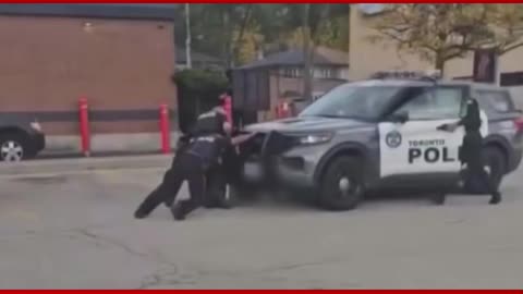 Toronto police cruiser seen running over suspect and officer in new video