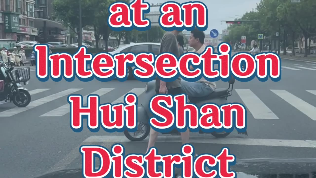 Waiting at an intersection in the Huishan District of Wuxi, China