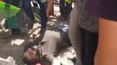 An Israeli air strike targets a number of journalists in the courtyards of the Baptist hospital