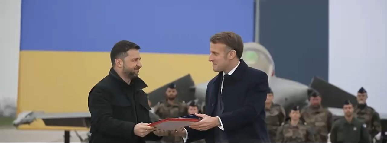 Zelensky and Macron sealed the signed military agreement with a hug.