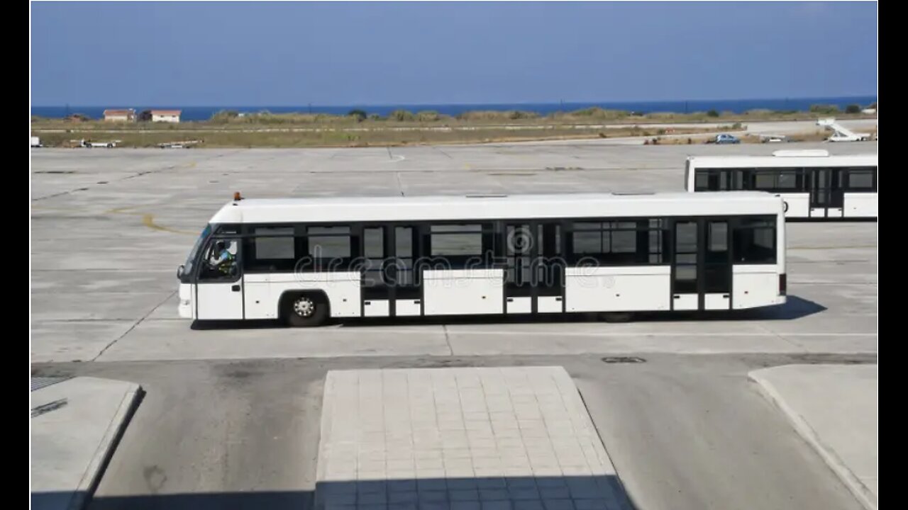Passenger bus at the airport. Picture are shot from the departure hall at rhodes airport and shows