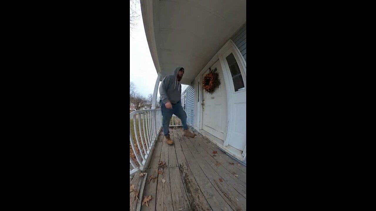 Man knocks on the door, then falls through the porch