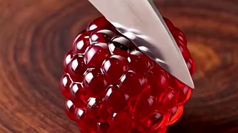 Glass Raspberry cut with knife satisfying ASMR