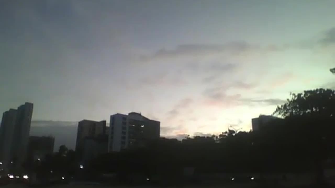 Beautiful view in the city sky almost at night from the beach [Nature & Animals]