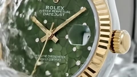 ROLEX DATEJUST OLIVE GREEN FLORAL MOTIF DIAMOND WATCH
