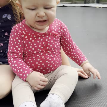 Sister time = the best time 💕 Baby Kayla and Kiara bouncing on the trampoline — smiles all around!