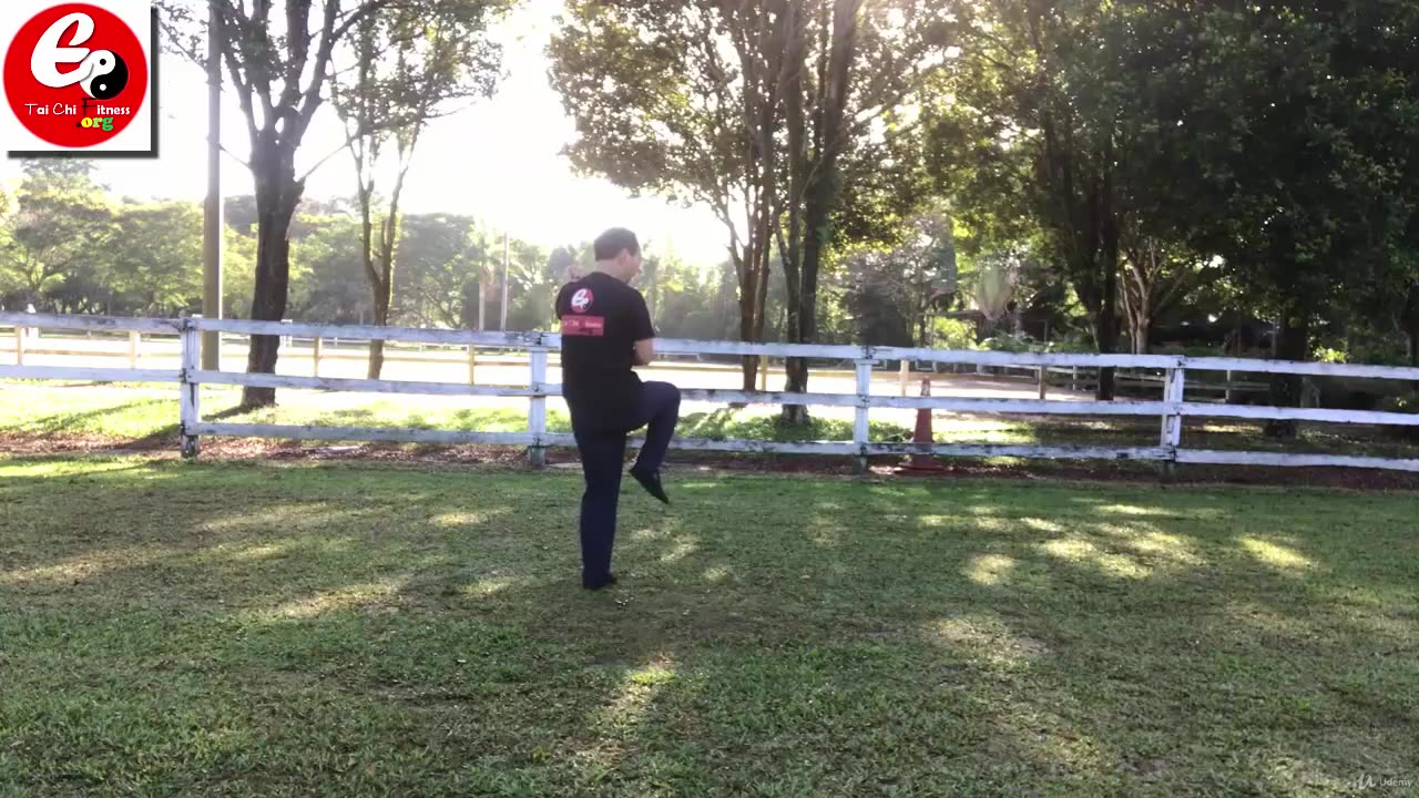 Aerobic Tai Chi Workout-037-Leap Turning with Right Side Backward Throwing Double Punch