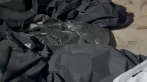 Al-Shifa hospital floors fill with the bodies of killed Palestinians