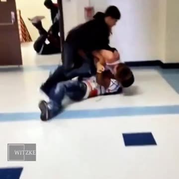 Two students fight a boy for not letting them steal from him.