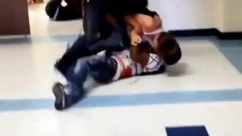 Two students fight a boy for not letting them steal from him.