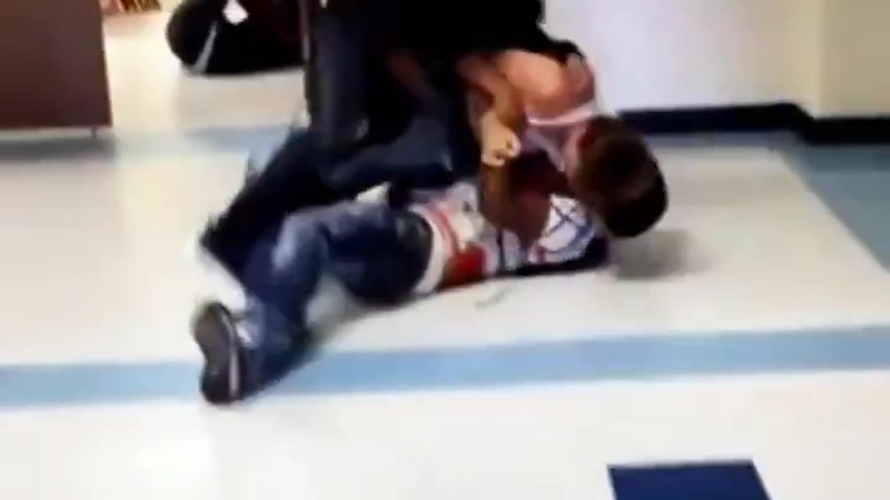 Two students fight a boy for not letting them steal from him.
