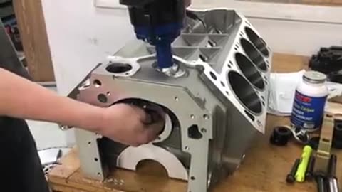 Checking distributor gear clearence.