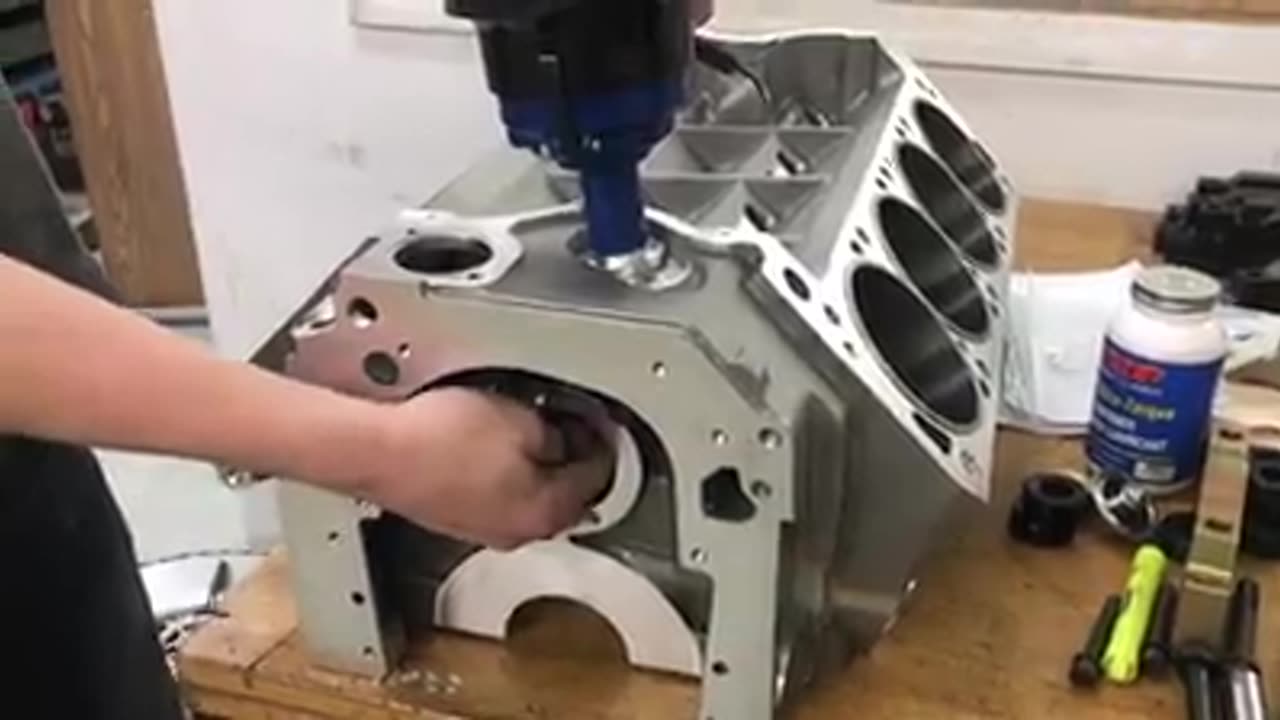 Checking distributor gear clearence.