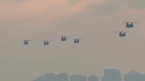 CH-47 Chinook flies over the Lincoln Memorial to celebrate the Army's 250th birthday.