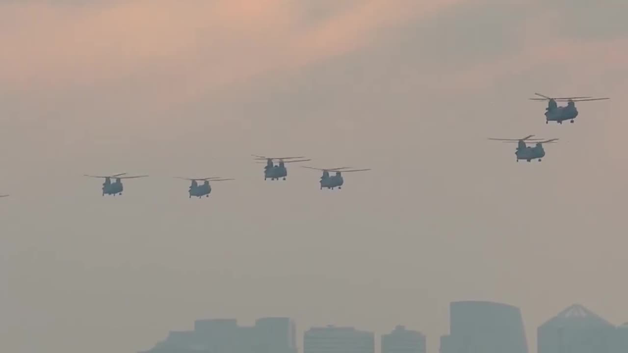 CH-47 Chinook flies over the Lincoln Memorial to celebrate the Army's 250th birthday.