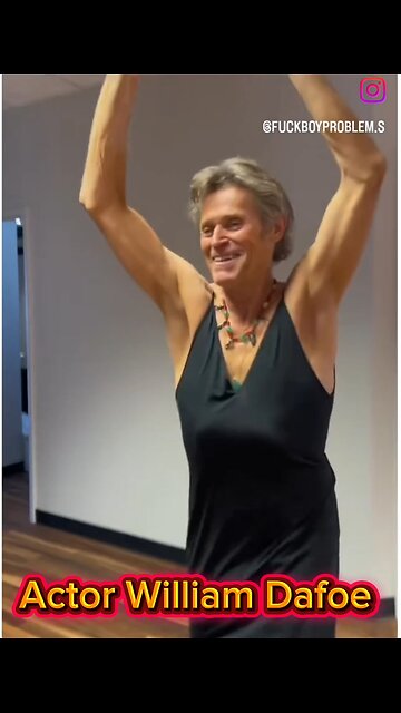 William Dafoe dances while wearing a dress