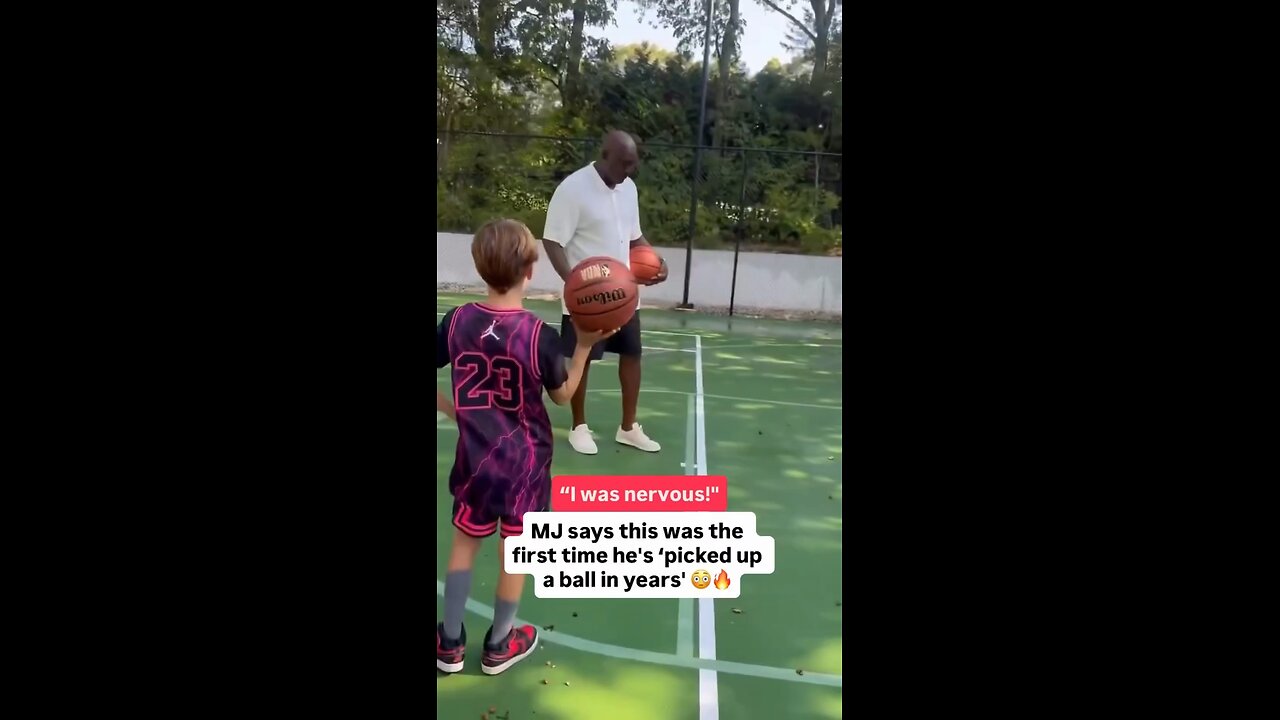 Michael Jordan takes a basketball shot after years away.