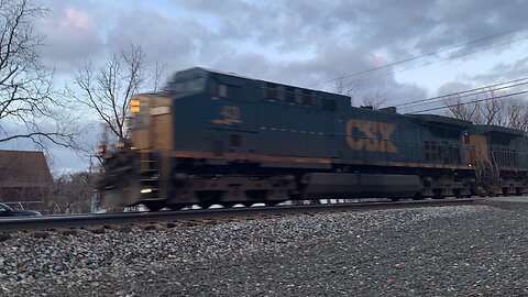 CSX Train 43 and 70 roll back through town