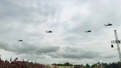 SKIES ABOVE FT BRAGG AS TRUMP COMES ON STAGE