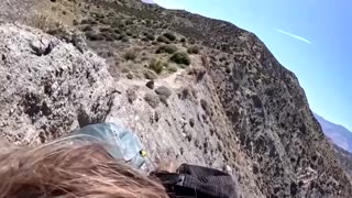 Video shows helicopter rescue of stranded hiker on California cliff