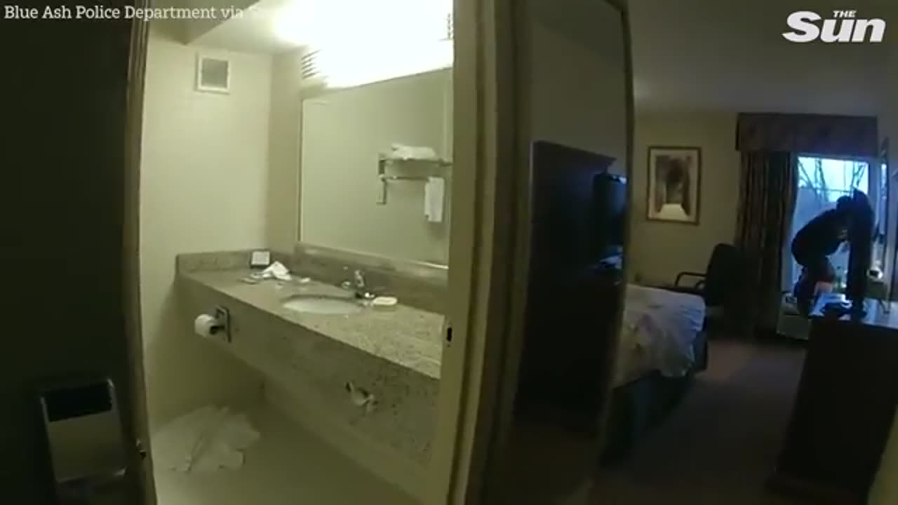 Black rape suspect bounces off reinforced glass while trying to jump through sixth floor window