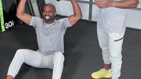DUMBBELL SIT UP TO OVERHEAD PRESS