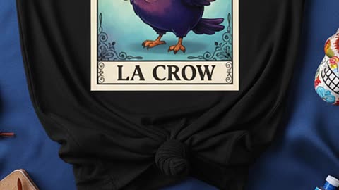 You won’t believe how cute La Crow looks on this tee… had to grab it fast! #loteriashirt #cutecrow