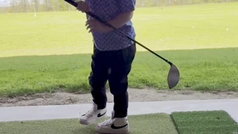Boy Hits His First Golf Ball