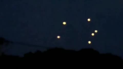 Wisconsin USA people capture luminous object that formed into a small fleet of luminous objects UFO