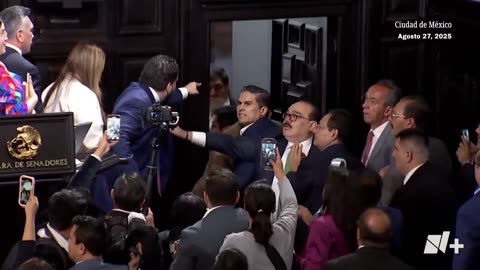 A literal FIST FIGHT just broke out on the floor of the Mexican Senate