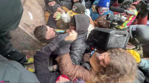 Minnesota Mob Pulls Conservative Jake Lang Into Crowd and Takes Him Away