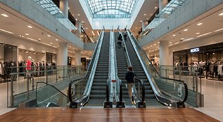 The Escalator is Moving in the Mall