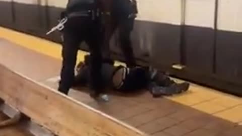 A man defends himself from a potential diverse knife attack with a skateboard.