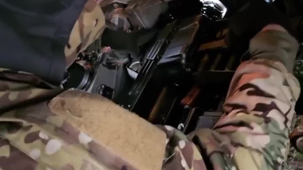 The interior of a BTR-80 and operation of the KPVT heavy machine gun.