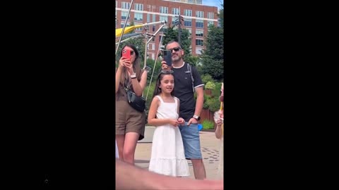 Quick Smile: Piano player in a park plays Hallelujah and many join in... beautiful