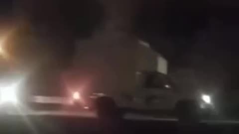 Iranian Police Officer Chases and Shoots at a Mossad Drone Van