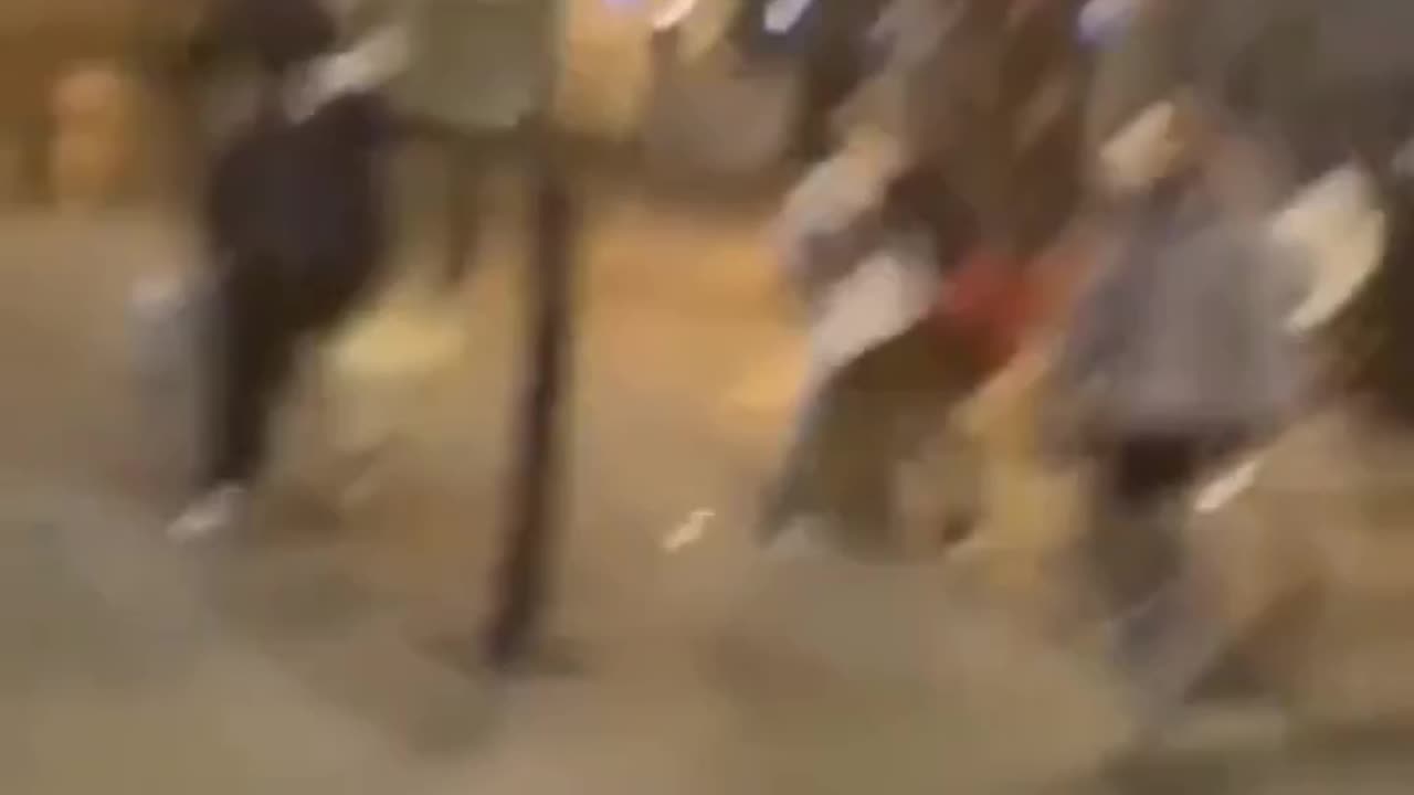 Truly unsettling scenes unfolding in Ireland lately. An Irish woman looks on in