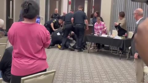 chaos at Marjorie Taylor Greene’s town hall a deranged protester
