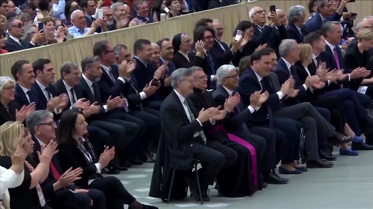 Pope Leo jokes about reporters' applause at start of first audience