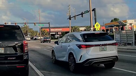 Insane Near-Miss: Reckless Cyclist Jaywalks into Oncoming Traffic – Driver's Swerve Saves the Day