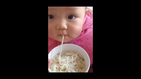 funny baby eating food