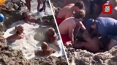 Horrifying moment kids get stuck in sand hole before beachgoers pull them out