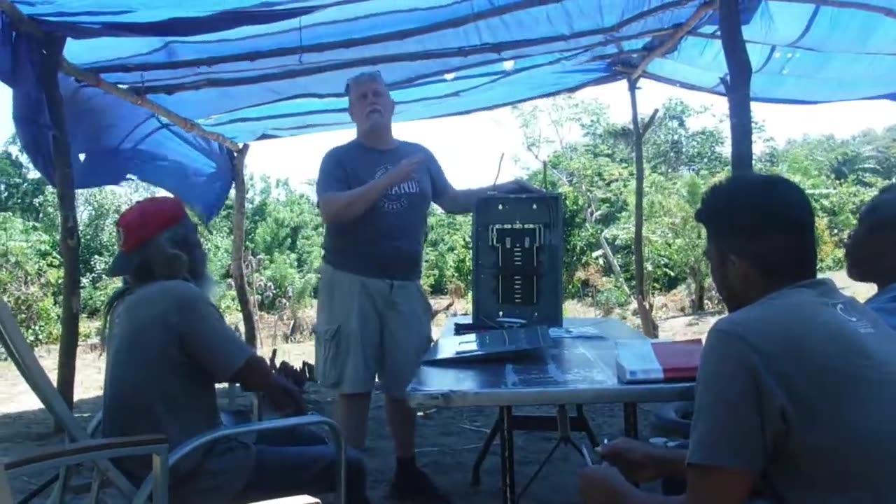 Teaching how to wire a panel at the Roatan Drug Rehab ministry