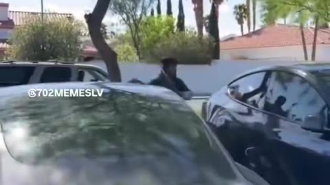 Liberal man ATTEMPTS to smash a Tesla window and gets arrested immediately after…