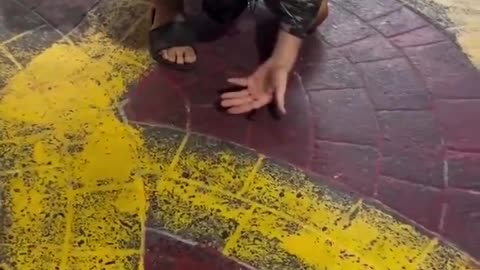 Thai woman flicks cockroach off tourist's head