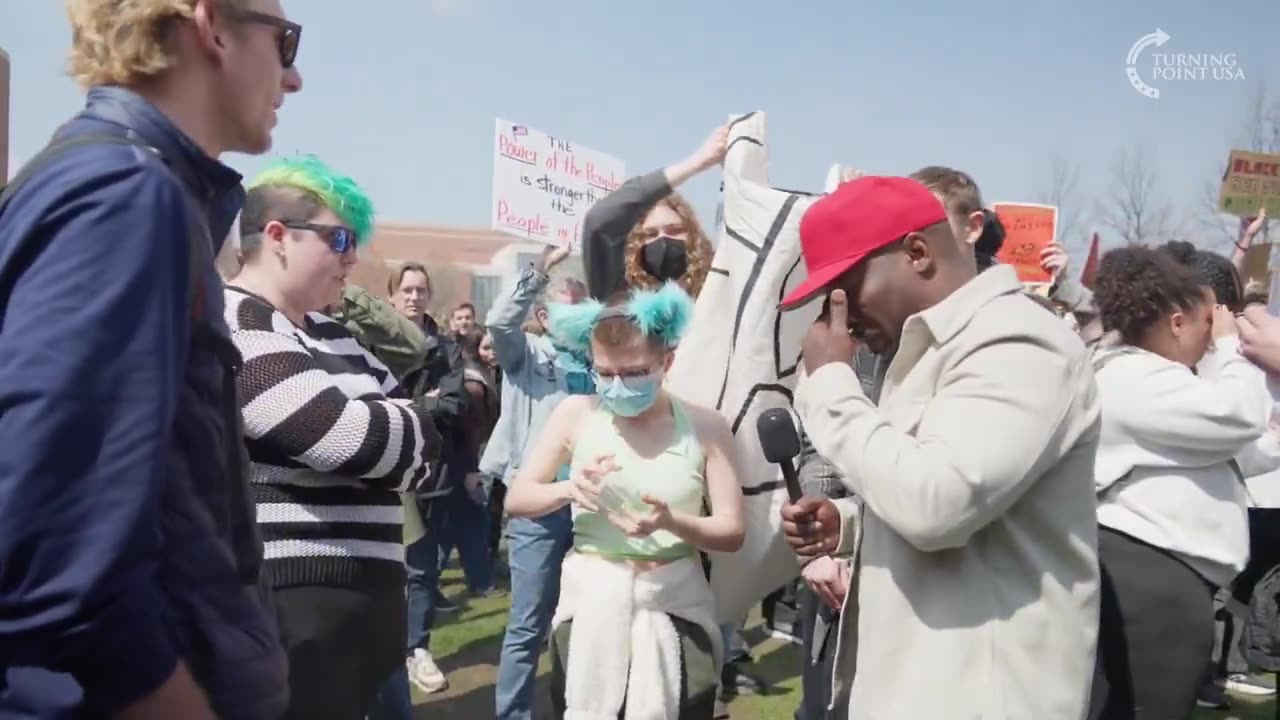 Racist liberal assaults black Trump supporter for simply asking a question "Prove Me Wrong" event