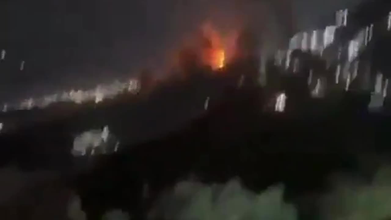 Suspected U.S. Apache and CH-47 aircraft fly over Caracas, Venezuela.