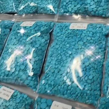 20250701-1 Natural Turquoise Cabochon: Deep-Sea Blues Gem on Fingertips