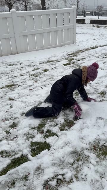 My Daughter Demonstrates How to Make a Giant Snowball