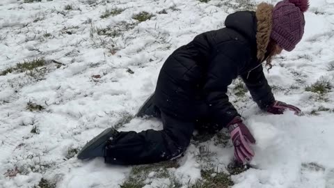 My Daughter Demonstrates How to Make a Giant Snowball
